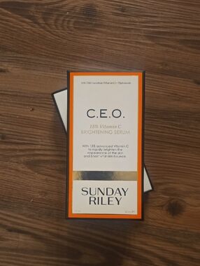 Sunday Riley C.E.O. Brightening Serum Box in White, Orange & Gold